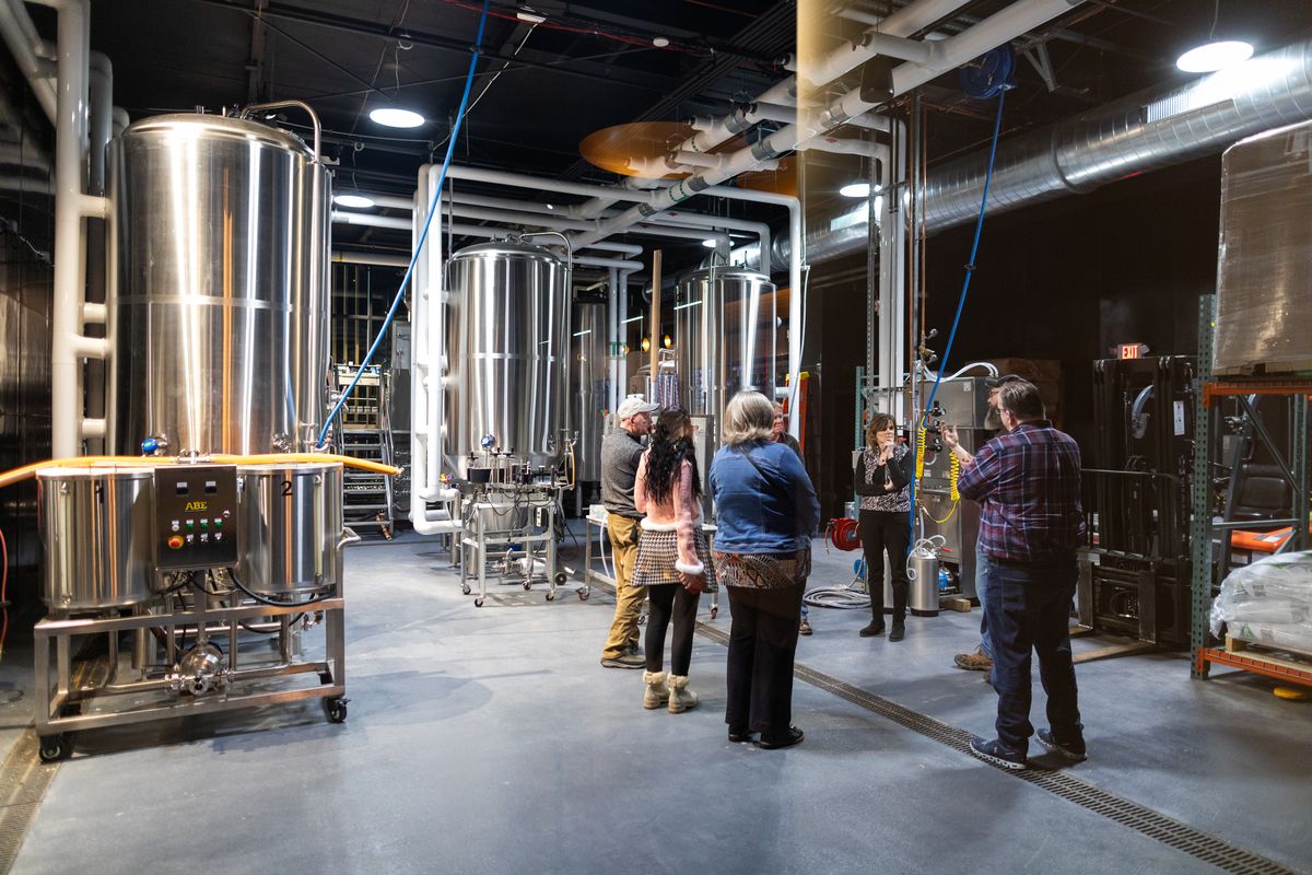 Brewhouse floor at Elicit Brewing Company, running day to day